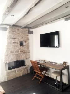 Appartements Wood Stone and Wine : photos des chambres