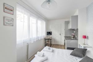 Appartements Sunny and cosy studio close to Part-Dieu district in Lyon - Welkeys : photos des chambres