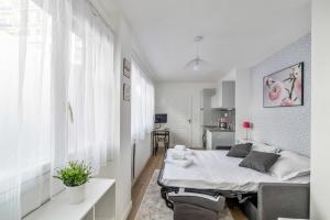 Appartements Sunny and cosy studio close to Part-Dieu district in Lyon - Welkeys : photos des chambres