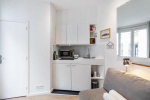 Appartements Cosy studio in Paris close to Grands Boulevards and Bourse - Welkeys : photos des chambres