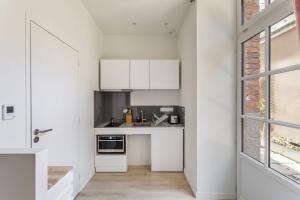 Appartements LA COUR DES CARMELITES 2 - Studio calme en centre-ville : photos des chambres