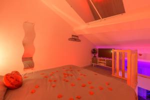 Appartements Love Room - Suite romantique avec spa privatif : photos des chambres