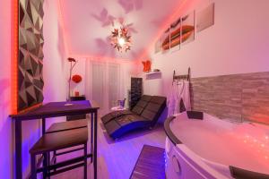 Appartements Love Room - Suite romantique avec spa privatif : photos des chambres