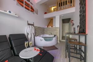 Appartements Love Room - Suite romantique avec spa privatif : photos des chambres