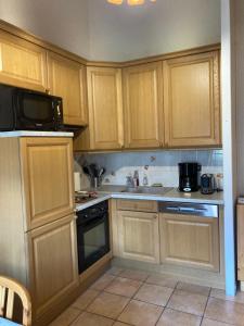 Appartement dans chalet typiquement savoyard au pied des pistes