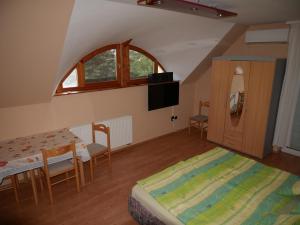 Laura Apartmanház