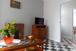 En plein centre, jolie maison pour 6 avec jardin