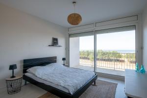 Appartements Entre les Pins et l'Ocean, un bel appartement pour 6 personnes : photos des chambres