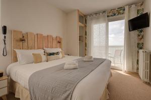 Hotels Beach Hotel - Le Grand Chalet : photos des chambres