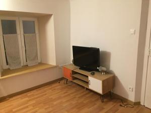 Appartements Caveau 1751 : photos des chambres