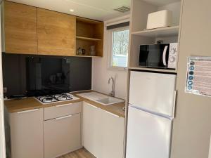 Campings Mobilhome tout confort R10 domaine de lanniron : photos des chambres