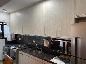 Flat Capitânia Varam Praia de Pitangueiras AP 53