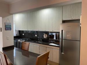 Flat Capitânia Varam Praia de Pitangueiras AP 53