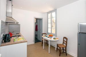 Appartements Jardin des Ursulines Saint-Emilion : photos des chambres