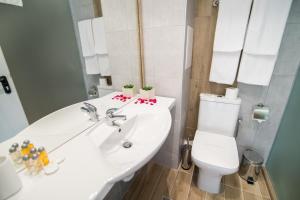 Double Room with Balcony (2 Adults + 1 Child) room in Cinema Hotel