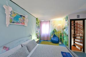 Night Galleria holiday home - bed & art in Burano - the pink house