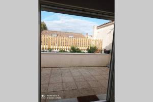 Appartements UNE TERRASSE EN VILLE : photos des chambres