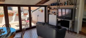 Corte Cavour. Una mansarda nel cuore della città