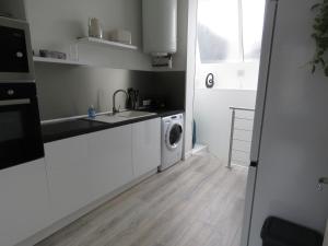 Appartements Le Modern'Blue entre centre ville et plage : photos des chambres