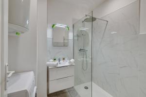 Appartements - Luxury Appart Climatise Plage - : photos des chambres