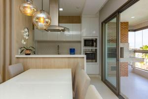 Punta Blu 102-9 – Apartamento de alto padrão em Condomínio Exclusivo, Quadra poliesportiva - Piscina - Portaria 24h.