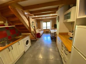 Appartements LE GENEPI bel appartement avec terrasse dans vieille ferme de montagne renovee : photos des chambres