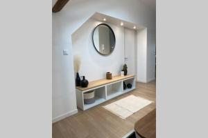 Appartements Un petit coin sous les toits : photos des chambres