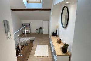 Appartements Un petit coin sous les toits : photos des chambres
