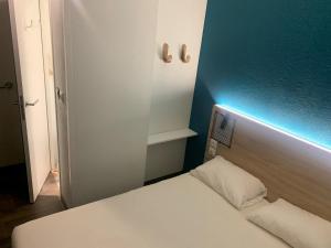 Hotels hotelF1 Saint Witz A1 Hotel : photos des chambres