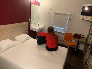 Hotels hotelF1 Saint Witz A1 Hotel : photos des chambres