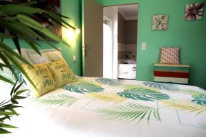Appartements T2 LE GREEN SPA SAUNA & BALNEO tout confort. : photos des chambres