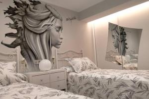 Arte y descanso. Apartamento ubicado al lado del Puerto deportivo, en pleno casco histórico-artístico de Cimadevilla y entre las dos principales playas de Gijón.