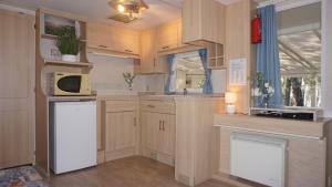 Campings Chalets met buitenkeuken op Camping Lei Suves - JoyCasa : Mobile Home