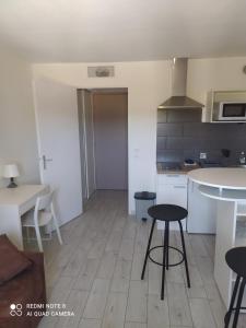 Appartements Charmant studio avec piscine et clim (en ete) : photos des chambres