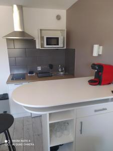 Appartements Charmant studio avec piscine et clim (en ete) : photos des chambres