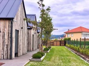 Casitas de Madera O Loureiro - A Igrexa