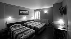 Hotels Les Hirondelles : Chambre Lits Jumeaux