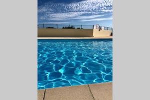 Appartements Charmant studio a 400m de la plage avec piscine : photos des chambres