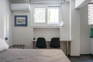 Pans Cave Studio in Plaka