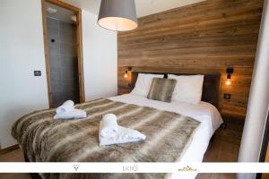 Appartements Marmotte 103 - Luxueux appartement aux pieds des pistes : photos des chambres