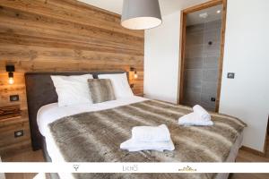 Appartements Marmotte 103 - Luxueux appartement aux pieds des pistes : photos des chambres
