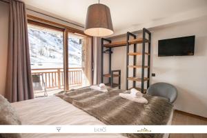 Appartements Marmotte 103 - Luxueux appartement aux pieds des pistes : photos des chambres