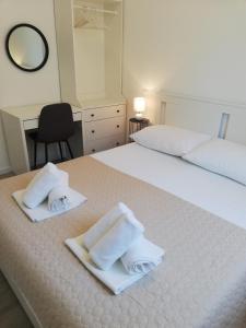 Casa Bianca family apartment near sandy beach with parking and rooftop experience
