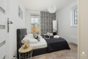 Tolles Familienapartment mit 3 Schlafzimmern einer Terrasse und Garage by Jantar Apartamenty