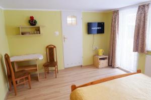 Pokoje Gościnne "Adam"