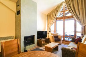 Les Terrasses dEos, 1-bed apartment with fireplace, Ski in, Ski out