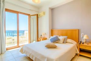 Triton Beachfront Village Hotel