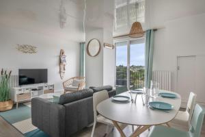 Appartements Le Pouliguen vous accueille pour un sejour dans ce bel appartement : photos des chambres