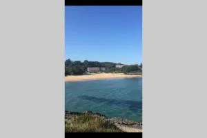 Duplex a pie de playa con piscina y tenis - Tobes y Rahedo