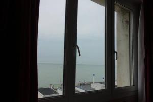 Appartements Appartement sur la digue avec vue sur mer : photos des chambres